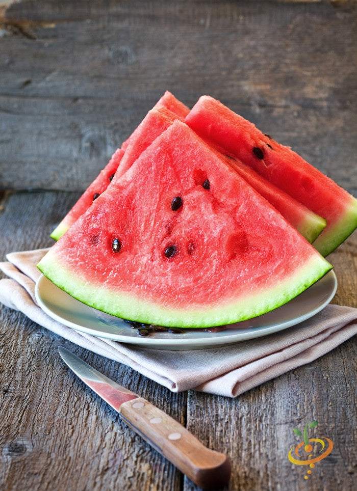 Slices of ripe Florida Giant watermelon with bright red flesh and