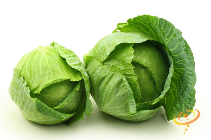 Golden Acre cabbage seeds from SeedsNow, close-up of vibrant green cabbage heads with leafy outer layers.