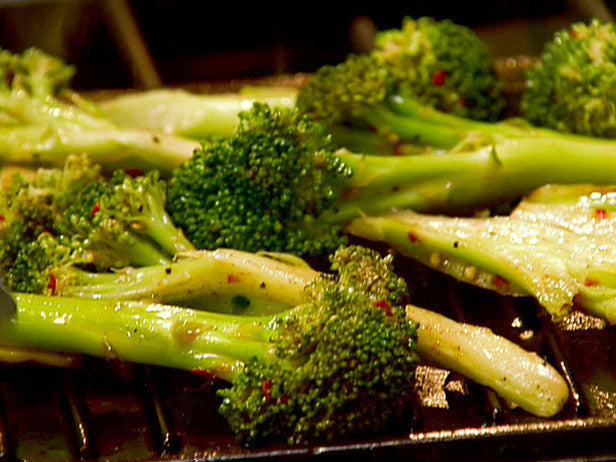 Fresh Calabrese broccoli seedling from SeedsNow, showing vibrant green broccoli plant with healthy leaves.