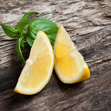 Basil Lemon seeds from SeedsNow, small green seeds for planting basil with lemon flavor, shown on a white background.