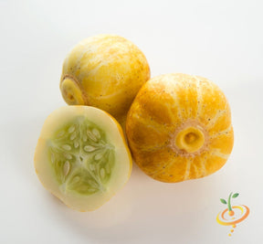 Three lemon cucumbers with one cut open showing seeds inside on a white background
